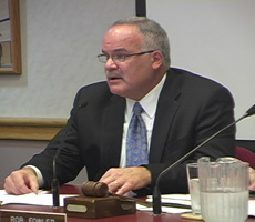 haslett-duda-230 School Superintendent Michael Duda read a prepared statement explaining the district's actions