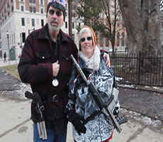 He brought his shotgun and she her military assault-style weapon